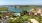 property exterior with tennis courts, volleyball, pool